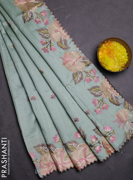 Semi raw silk saree pastel green with embroidered buttas and embroidery border