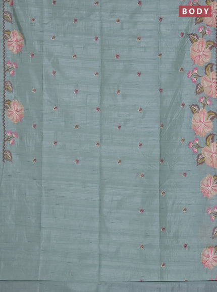 Semi raw silk saree pastel green with embroidered buttas and embroidery border