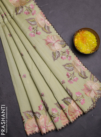 Semi raw silk saree pista green with embroidered buttas and embroidery border
