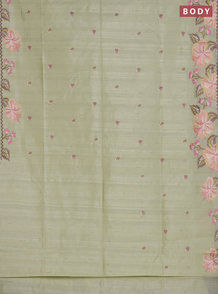 Semi raw silk saree pista green with embroidered buttas and embroidery border
