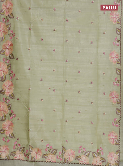 Semi raw silk saree pista green with embroidered buttas and embroidery border
