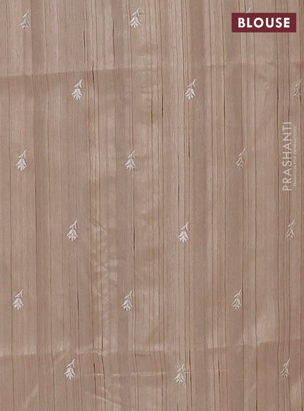 Semi raw silk saree beige with embroidered buttas and embroidery border