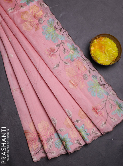 Semi raw silk saree peach shade with embroidered buttas and embroidery border