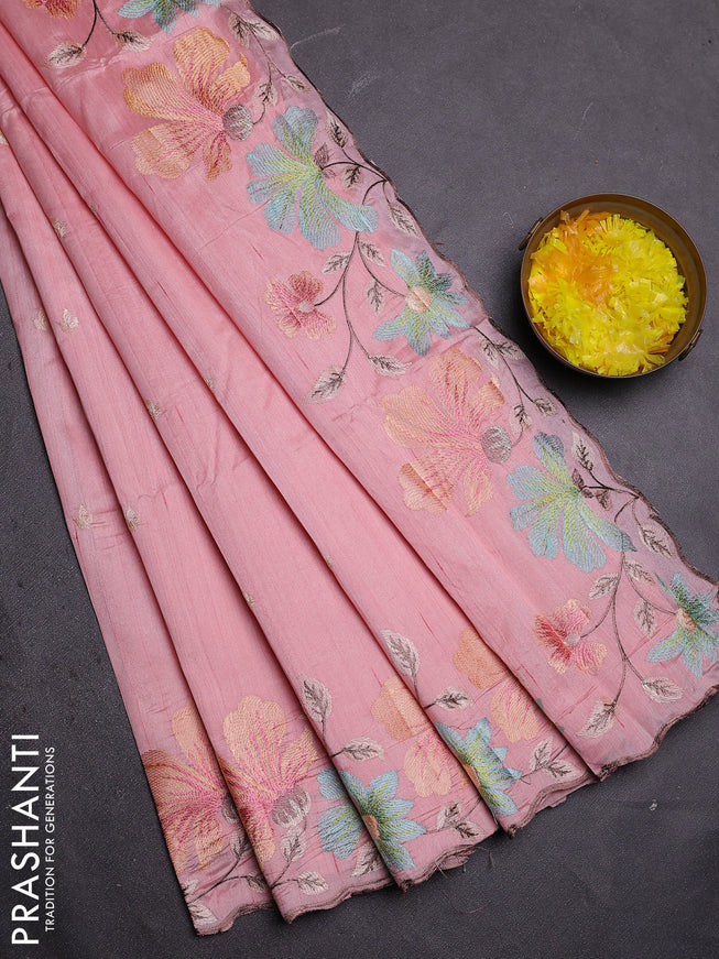 Semi raw silk saree peach shade with embroidered buttas and embroidery border
