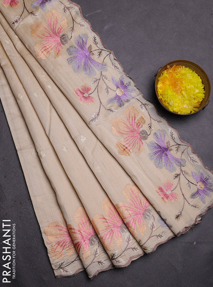 Semi raw silk saree cream with embroidered buttas and embroidery border