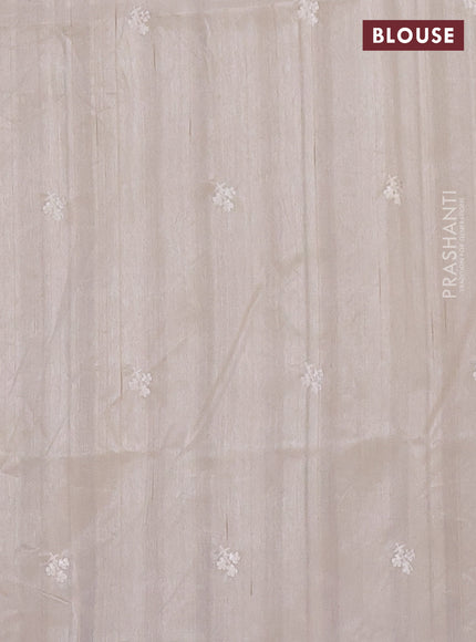 Semi raw silk saree cream with embroidered buttas and embroidery border