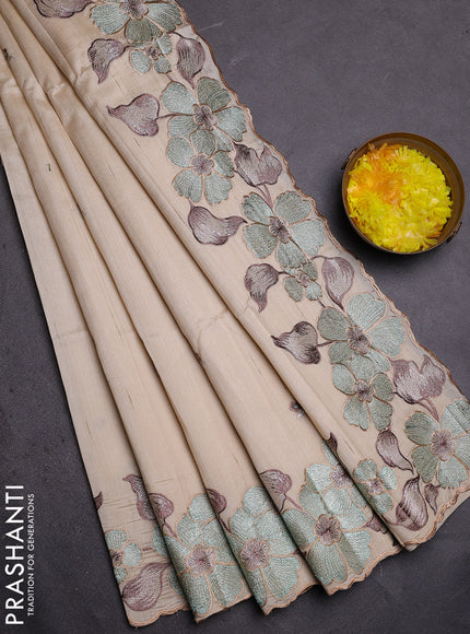 Semi raw silk saree cream with embroidered buttas and embroidery border