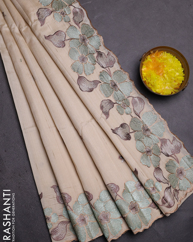 Semi raw silk saree cream with embroidered buttas and embroidery border