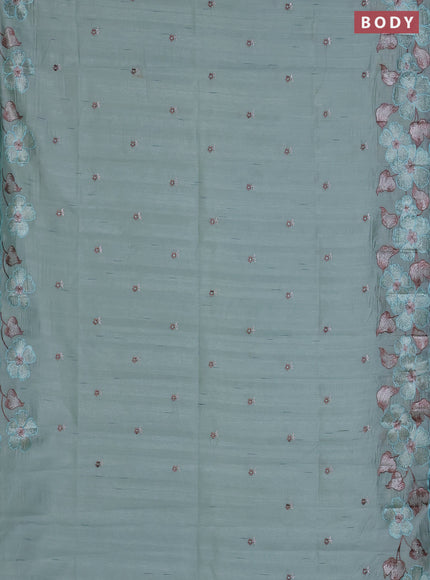 Semi raw silk saree pastel green with embroidered buttas and embroidery border
