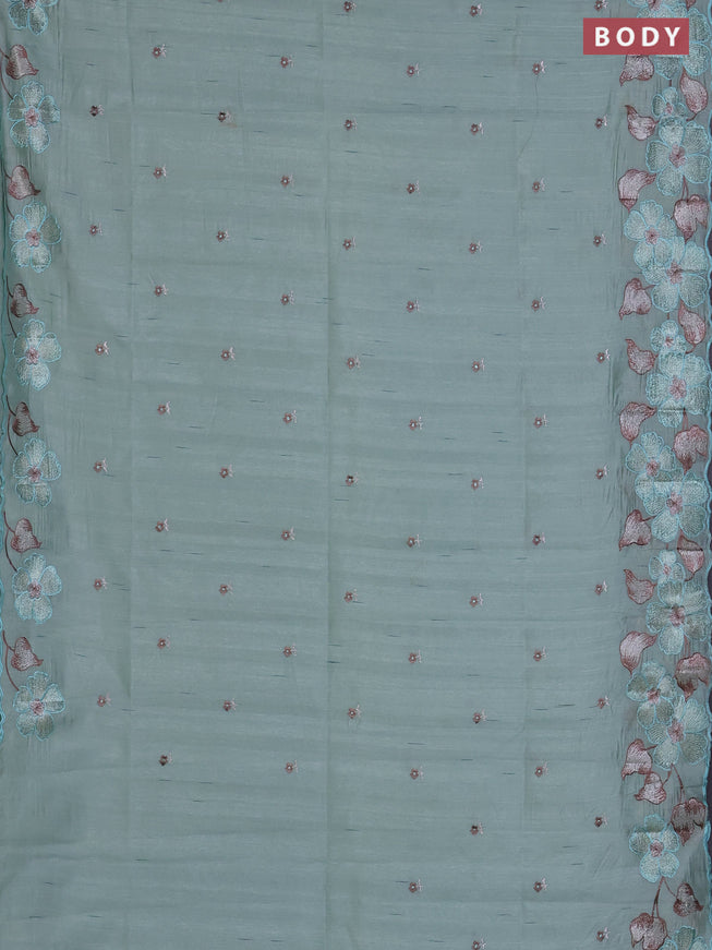 Semi raw silk saree pastel green with embroidered buttas and embroidery border