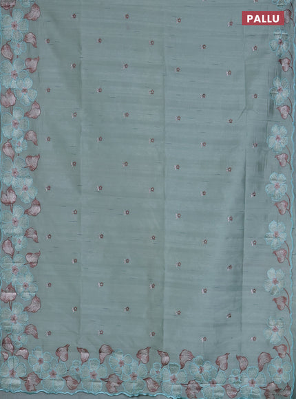 Semi raw silk saree pastel green with embroidered buttas and embroidery border