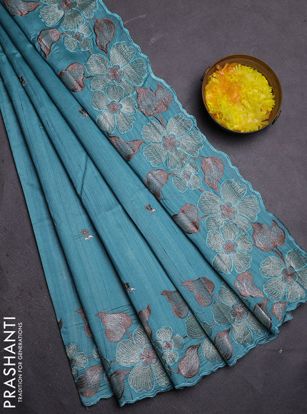 Semi raw silk saree teal blue with embroidered buttas and embroidery border
