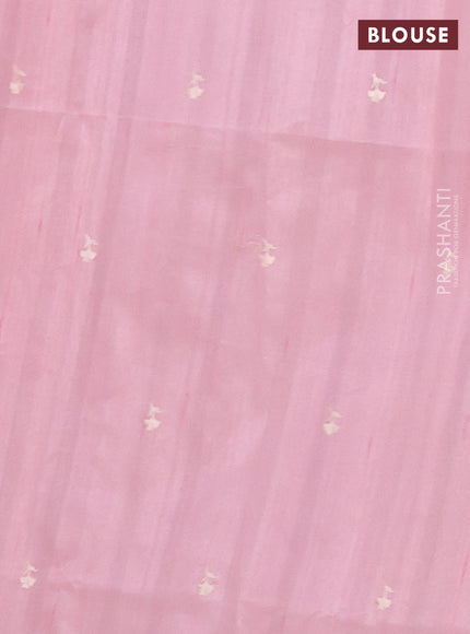 Semi raw silk saree peach shade with embroidered buttas and embroidery border