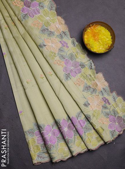 Semi raw silk saree pista green with embroidered buttas and embroidery border