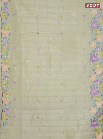 Semi raw silk saree pista green with embroidered buttas and embroidery border