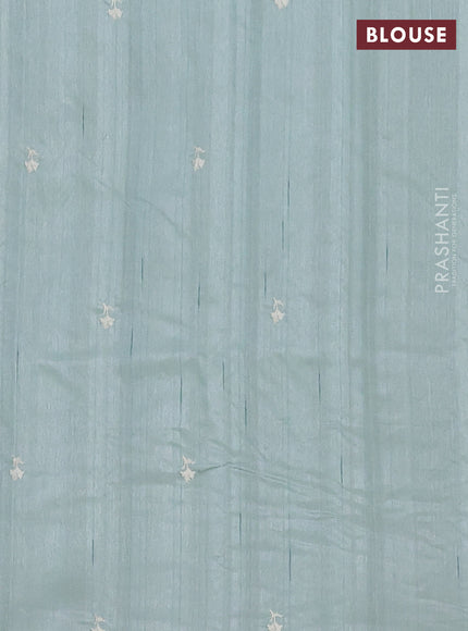 Semi raw silk saree pastel green with embroidered buttas and embroidery border