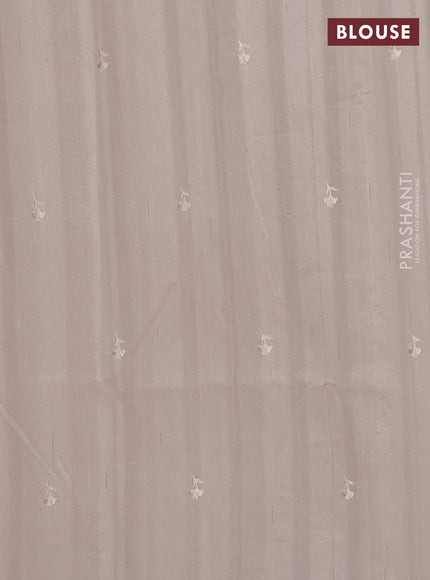 Semi raw silk saree cream with embroidered buttas and embroidery border