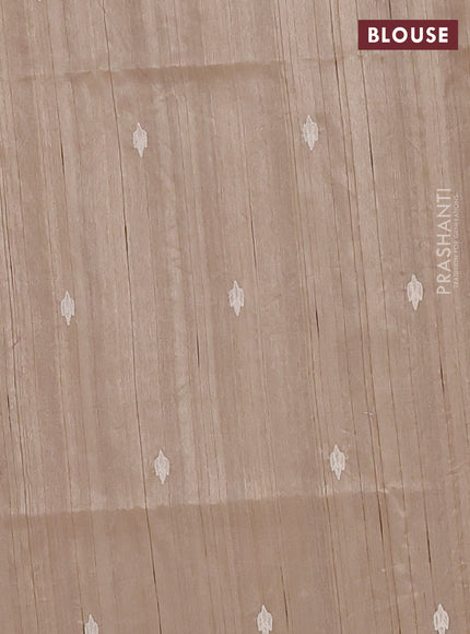 Semi raw silk saree beige with embroidered buttas and embroidery cut work border