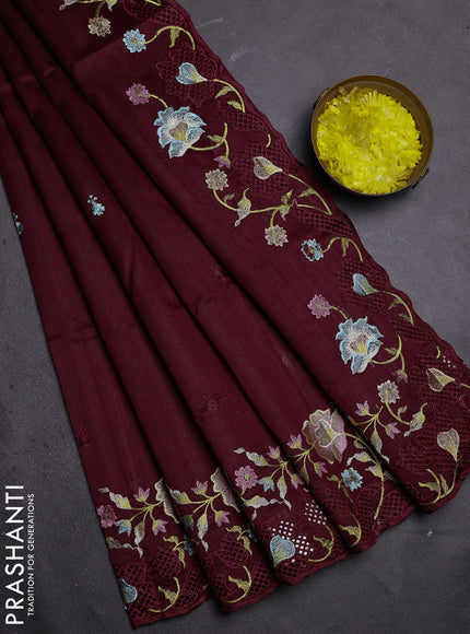 Semi raw silk saree maroon with embroidered buttas and embroidery cut work border