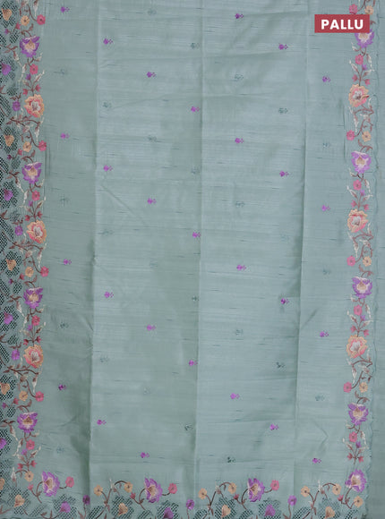 Semi raw silk saree pastel green with embroidered buttas and embroidery cut work border