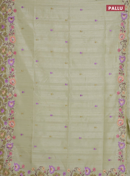 Semi raw silk saree pista green with embroidered buttas and embroidery cut work border