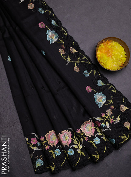 Semi raw silk saree black with embroidered buttas and embroidery cut work border
