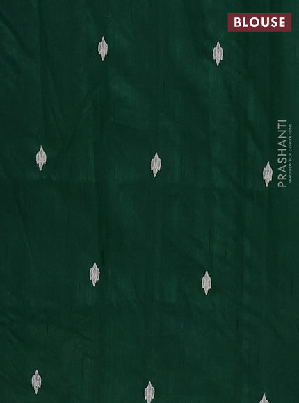 Semi raw silk saree green with embroidered buttas and embroidery cut work border