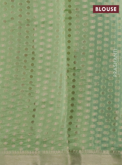 Banarasi poona silk saree green with zari woven floral buttas and zari woven border
