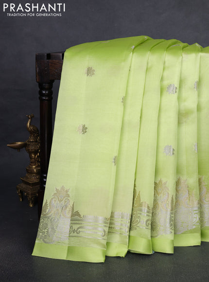 Banarasi poona silk saree pista green with silver & gold zari woven buttas and rich zari woven border