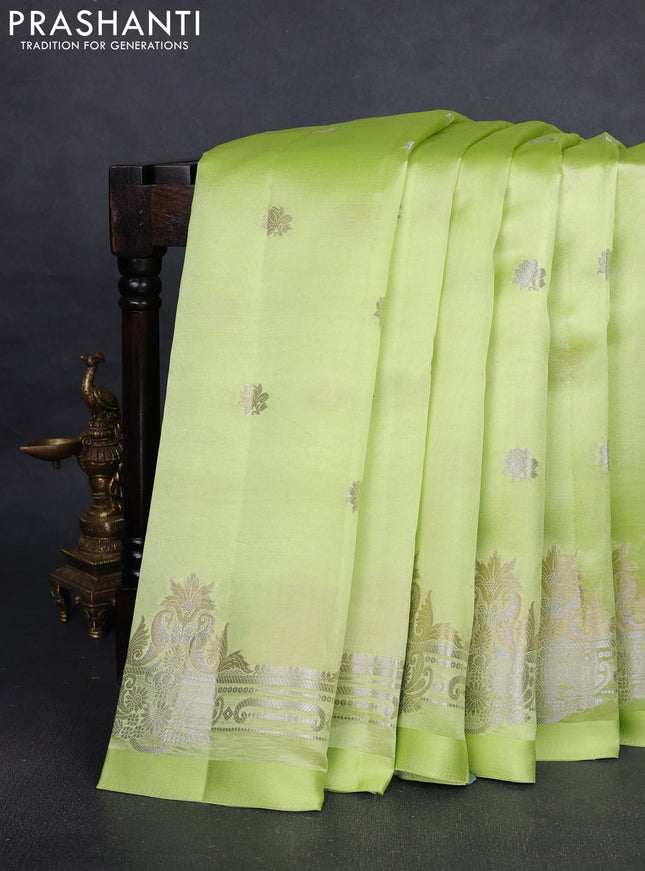 Banarasi poona silk saree pista green with silver & gold zari woven buttas and rich zari woven border