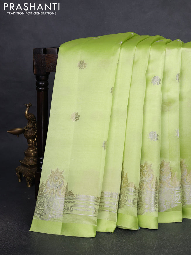 Banarasi poona silk saree pista green with silver & gold zari woven buttas and rich zari woven border