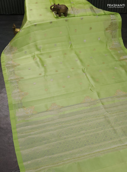Banarasi poona silk saree pista green with silver & gold zari woven buttas and rich zari woven border