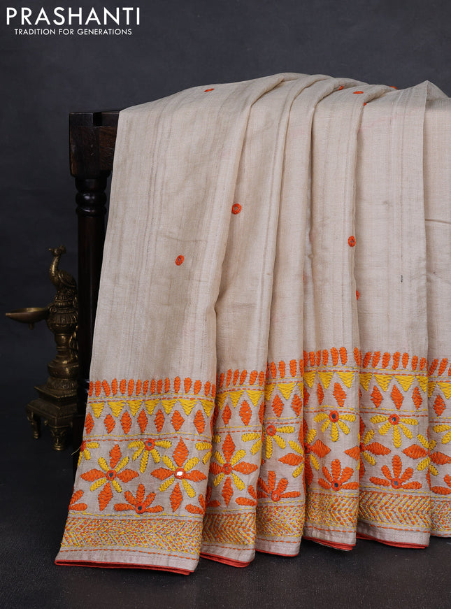 Pure tussar silk saree cream and orange with embroidered mirror buttas and kantha stitch work pallu