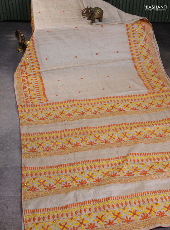 Pure tussar silk saree cream and orange with embroidered mirror buttas and kantha stitch work pallu