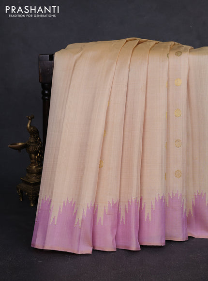 Pure gadwal silk saree cream and lotus pink with zari woven buttas and temple design boder