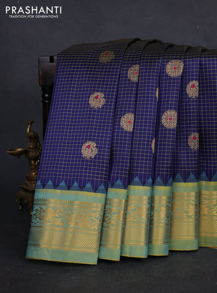 Pure gadwal silk saree navy blue and dual tone light green with allover zari checks & buttas and temple design zari woven border