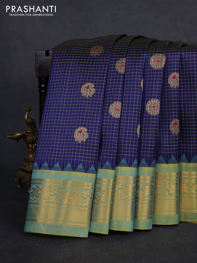 Pure gadwal silk saree navy blue and dual tone light green with allover zari checks & buttas and temple design zari woven border