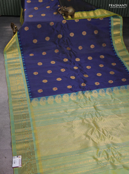 Pure gadwal silk saree navy blue and dual tone light green with allover zari checks & buttas and temple design zari woven border