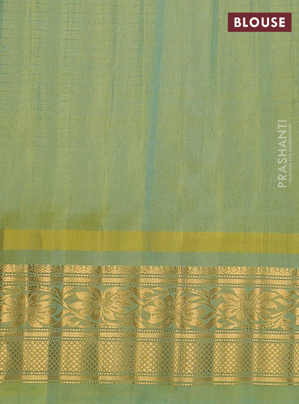 Pure gadwal silk saree navy blue and dual tone light green with allover zari checks & buttas and temple design zari woven border