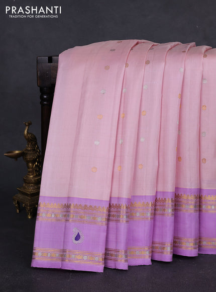 Pure gadwal silk saree mild peach and mild lavender with allover silver & gold zari woven buttas and rettapet zari woven paisley butta border