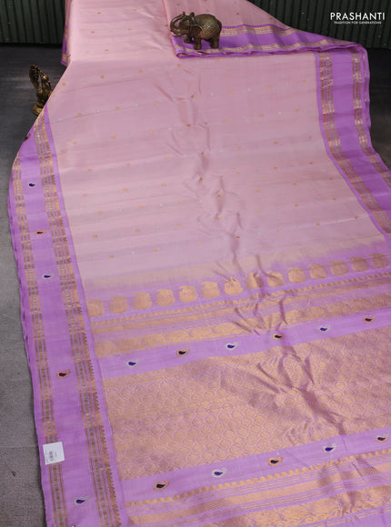Pure gadwal silk saree mild peach and mild lavender with allover silver & gold zari woven buttas and rettapet zari woven paisley butta border