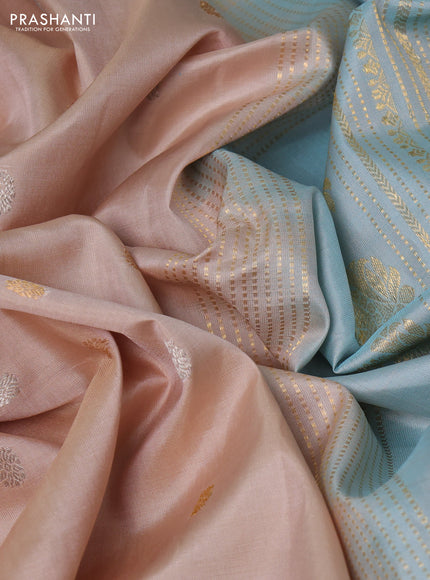 Pure gadwal silk saree sandal and light blue with silver & gold zari woven buttas and rettapet zari woven border