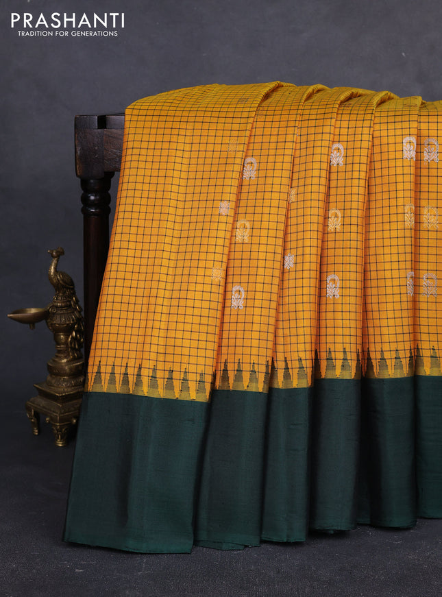 Pure gadwal silk saree mango yellow and bottle green with allover checks & zari buttas and temple design simple border