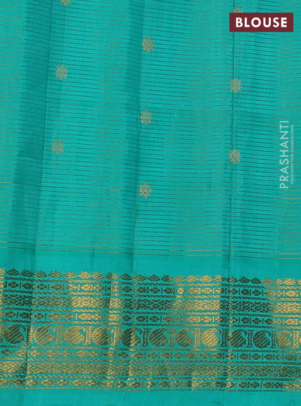 Pure gadwal silk saree teal green with allover zari stripe & buttas and rich zari woven border