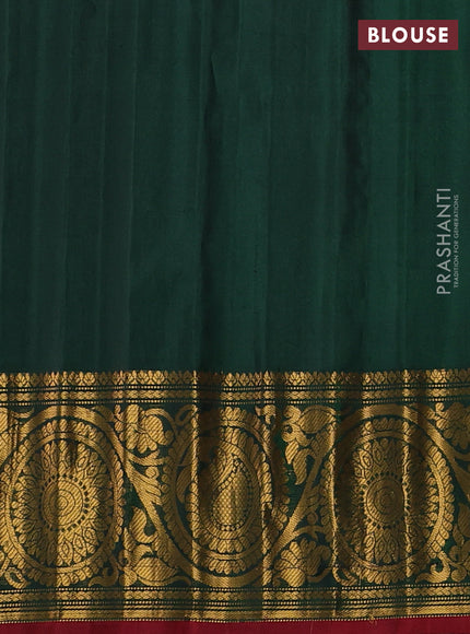 Pure gadwal silk saree bottle green with allover zari woven buttas and rich paisley zari woven border