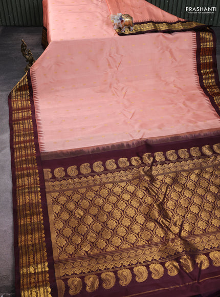 Pure gadwal silk saree peach orange and deep wine with allover zari woven buttas and rich zari woven border