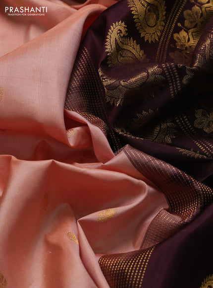 Pure gadwal silk saree peach orange and deep wine with allover zari woven buttas and rich zari woven border