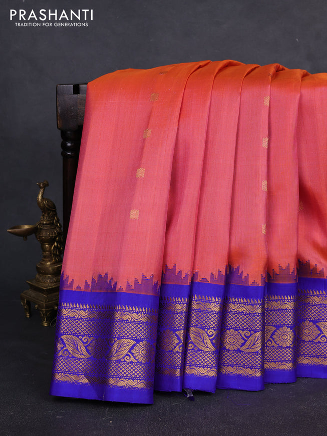 Pure gadwal silk saree peach orange and blue with allover zari woven buttas and temple design zari woven border