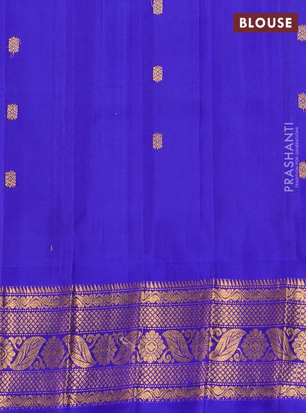 Pure gadwal silk saree peach orange and blue with allover zari woven buttas and temple design zari woven border
