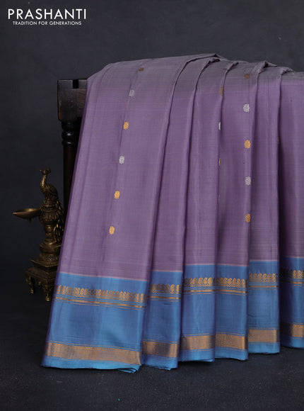 Pure gadwal silk saree pastel purple and dual tone blue with silver & gold zari woven buttas and rettapet zari woven border